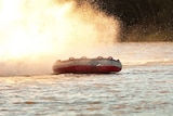 An inflatable tube making a splash.