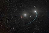 an image of a galaxy, with a small rounded red streak to indicate the pull of the black hole, and two blue ones for the stars