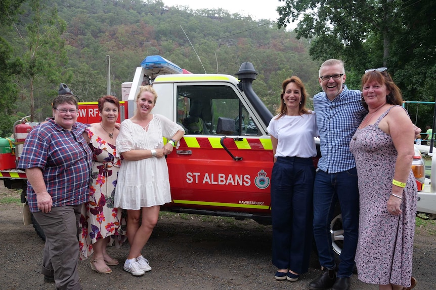 The St Albans RFS crew stand by one of their light vehicles.