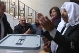 Homs under fire as vote begins