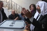 Homs under fire as vote begins