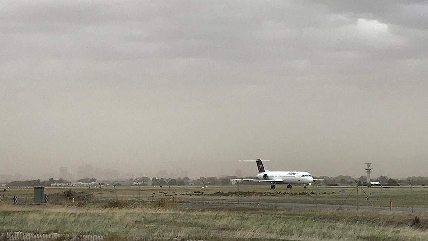 Dust at Adelaide Airport as a cold front pushes across.
