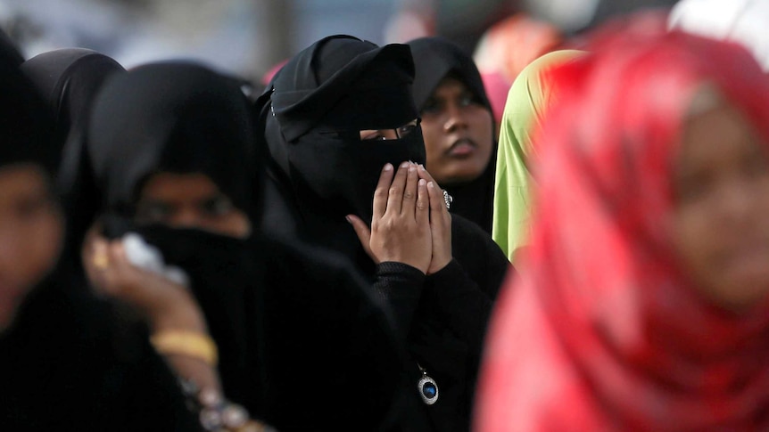 A Muslim woman wearing a veil