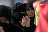 A Muslim woman wearing a veil