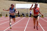 Early advantage ... Melissa Breen (R) edges out Sally Pearson in Canberra