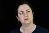 Premier Annastacia Palaszczuk with a serious expression.