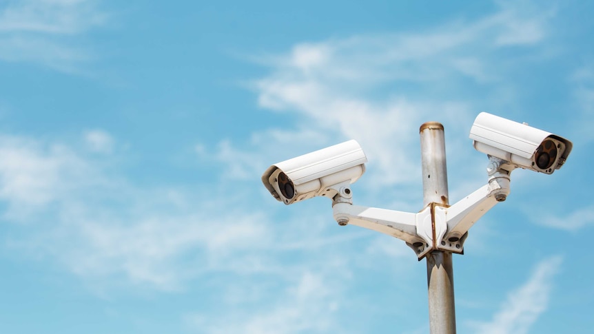 Low Angle View Of Security Camera Against Sky