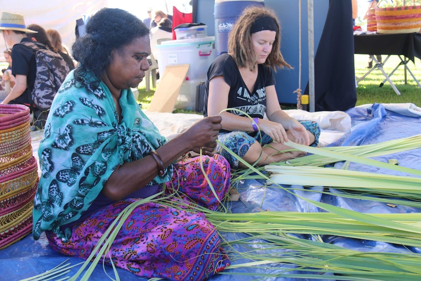 Miliwanga Sandy conducting basket weaving workshops