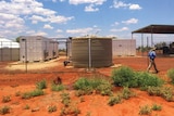 Water tanks in a remote indigenous community that took part in a water-saving study