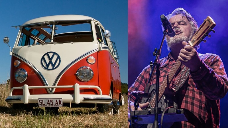 red VW wagon with white hood and man with grey hair and beard with a guitar singing into a mic