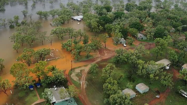 An aerial shot of a remote community flooded