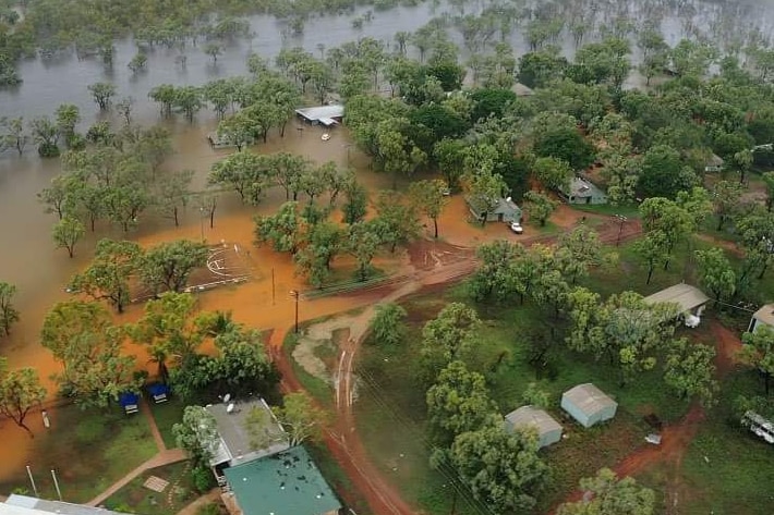 An aerial shot of a remote community flooded
