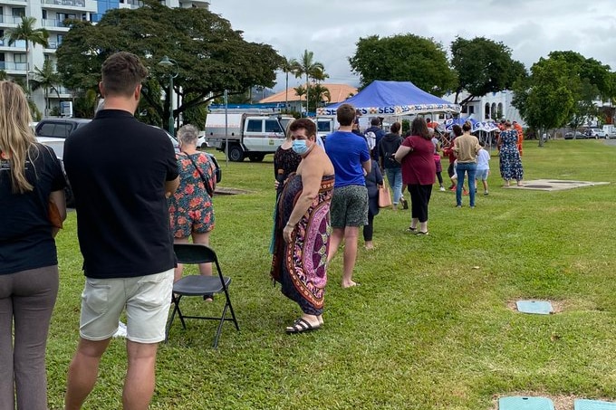 People lining up at a COVID testing tent 