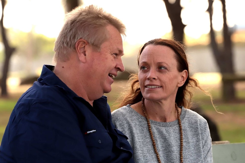 Michael and Sharon Camac stand outside.