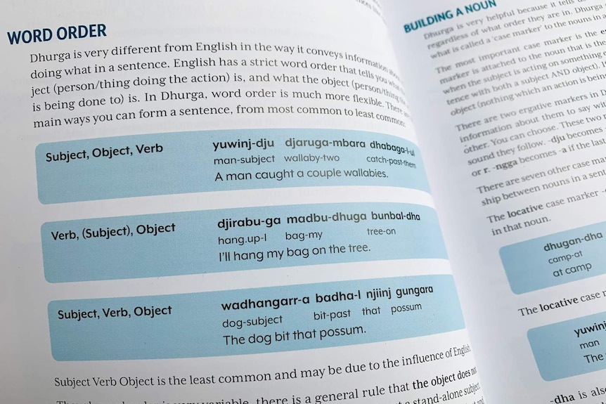 Dictionary open to page with guide to constructing sentences in Dhurga language