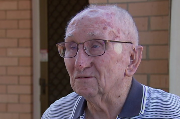 Adelaide man Brian Dallow speaks to media outside his home.