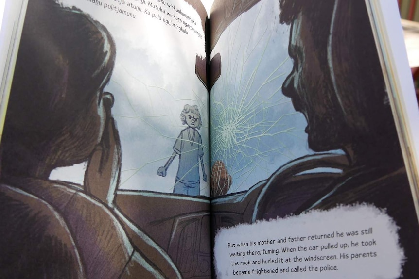 Pages from a book showing a man and women in car with a cracked windscreen and a boy outside who is angry.