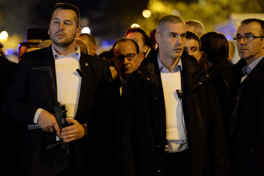 French president Francois Hollande arrives at the scene of an attack in Paris