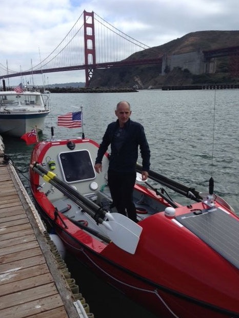 British solo ocean rower John Beeden with his six-metre boat 'Socks II' at San Francisco in the US in June 2015.