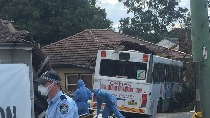 Bus crashed into a house.
