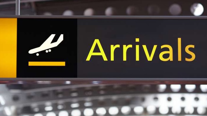 Arrival sign in airport, generic image.