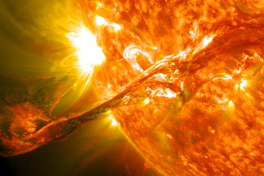 A large fiery solar flare erupting from the Sun