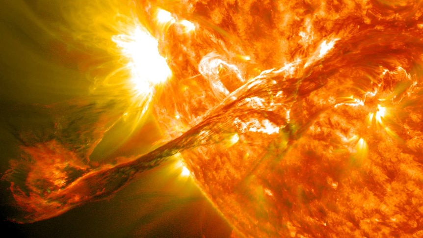 A large fiery solar flare erupting from the Sun