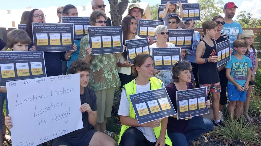 Around 20 Lockridge residents hold placards protesting against the location of the Bennett Brook Disability Justice Centre.