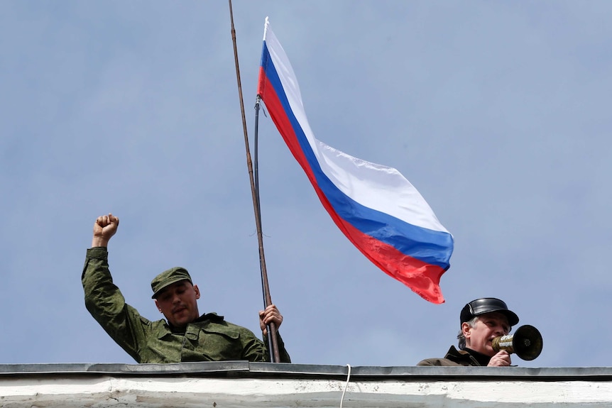 Russian flag held atop Ukraine naval headquarters