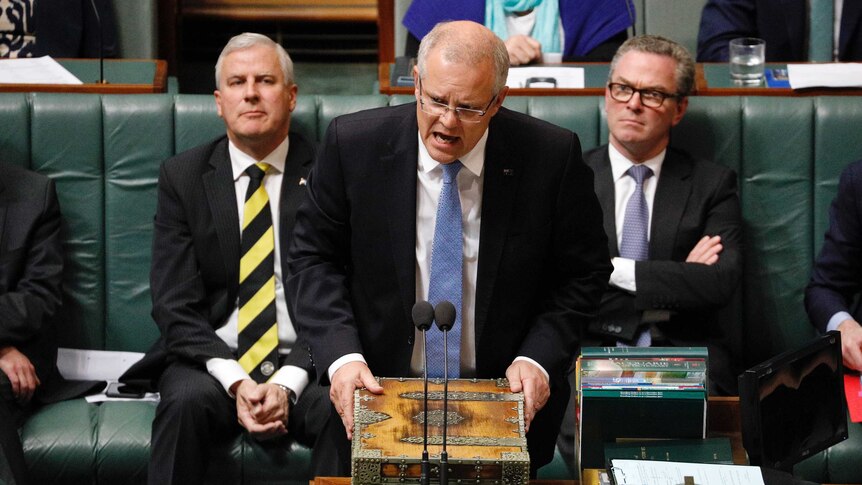 PM Scott Morrison shouts at the opposition, with Deputy PM Michael McCormack and Minister Christopher Pyne behind