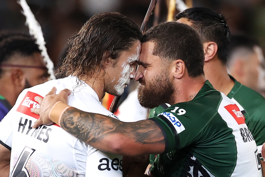 Nicho Hynes of the Indigenous All Stars and Kenny Bromwich of the Maori All Stars exchange maori greeting
