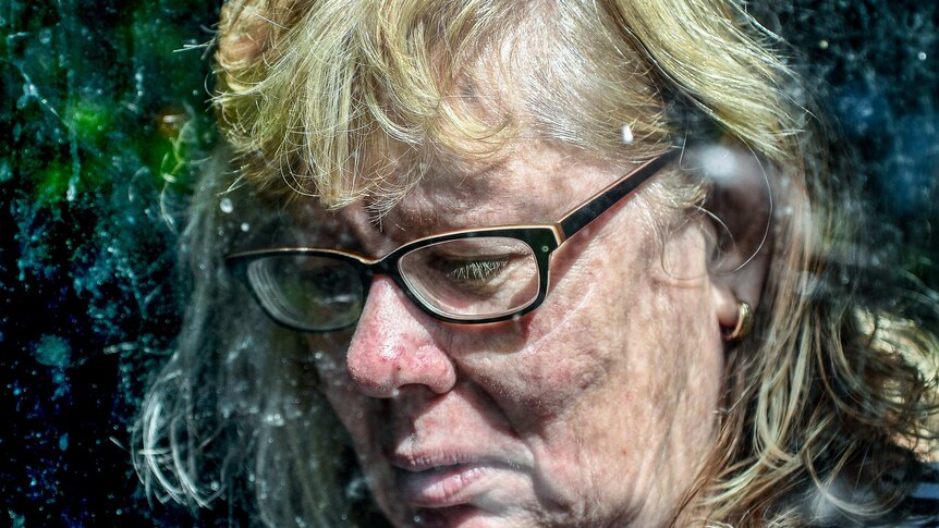 Vicki Walker still has a scar curved across the side of her face from where her son attacked her.