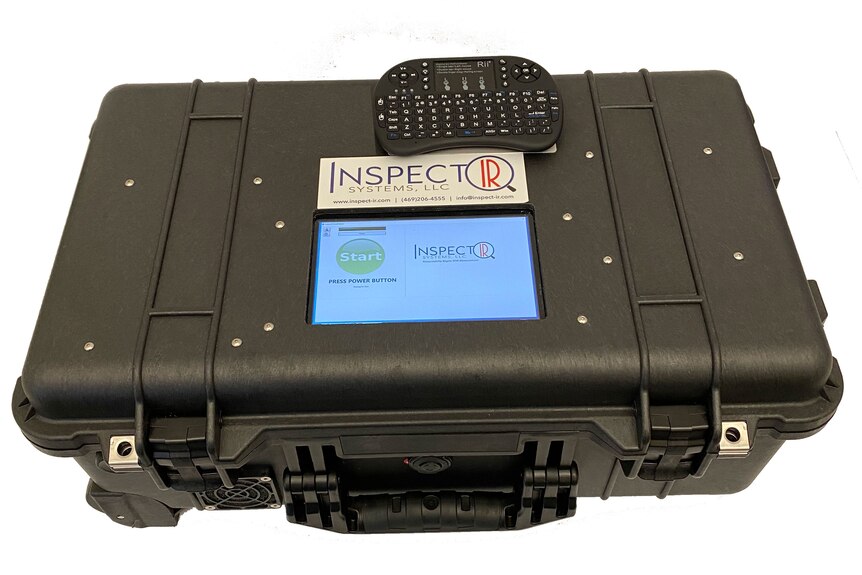 A large black box labelled InspectIR with a handle and display screen
