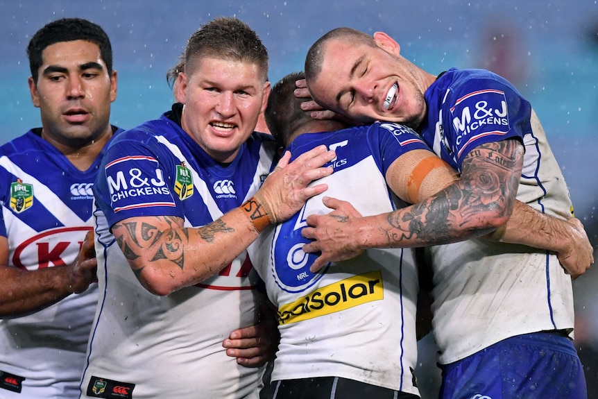 Bulldogs huddle up after a try