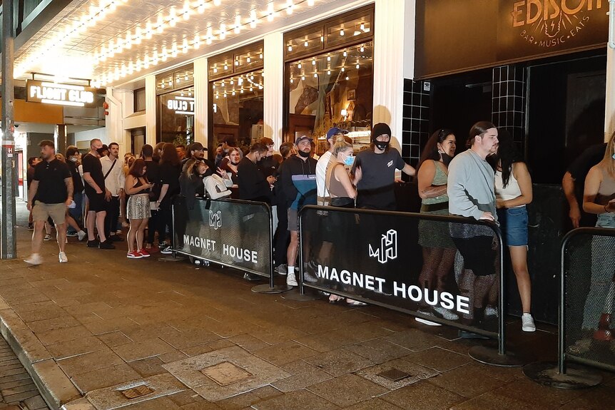 A long line outside a nightclub 