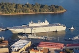 HMAS Adelaide  in the water near Garden Island, Sydney.