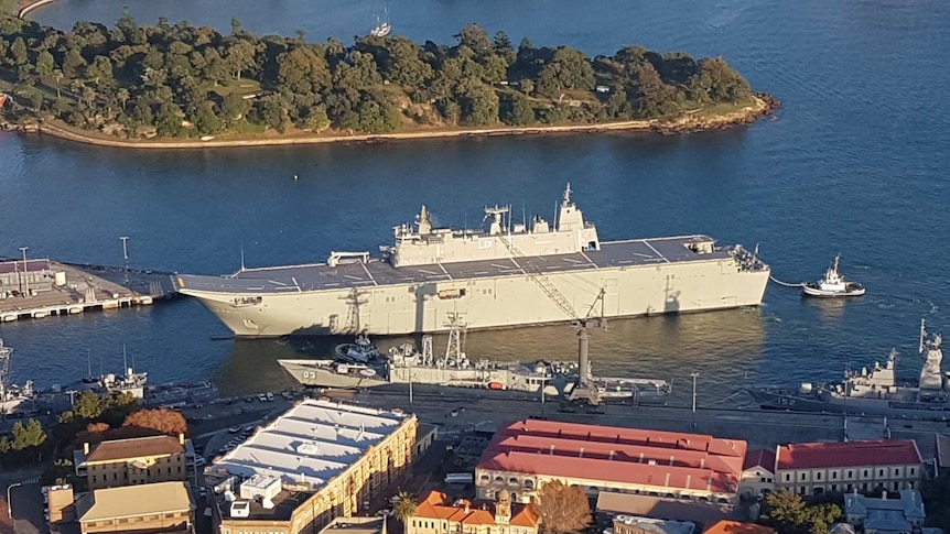 HMAS Adelaide in the water near Garden Island, Sydney.