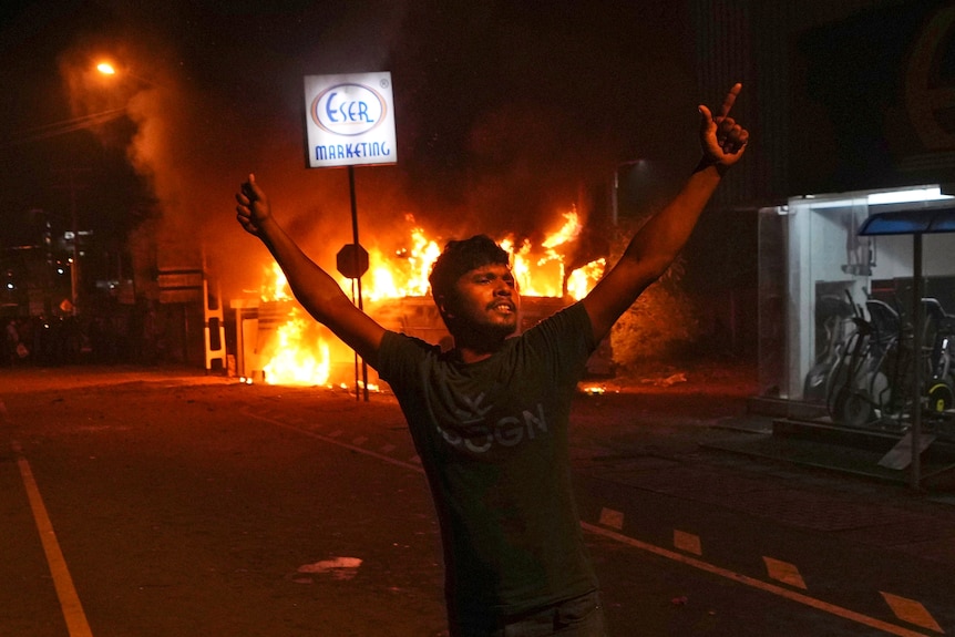 A Sri Lankan shouts anti government slogans during a protest outside Sri Lankan president's private residence.