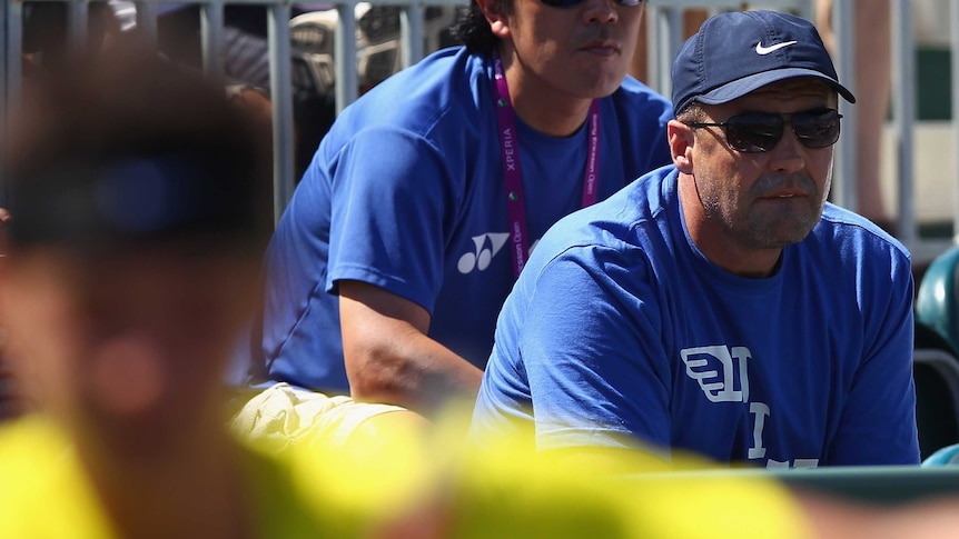 John Tomic keeps a close eye on his son Bernard Tomic during a match in March 2012.