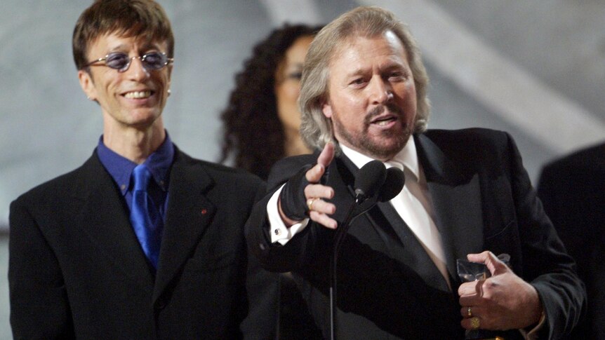 Robin and Barry Gibb accept the Legends Award at the 2003 Grammy Awards.