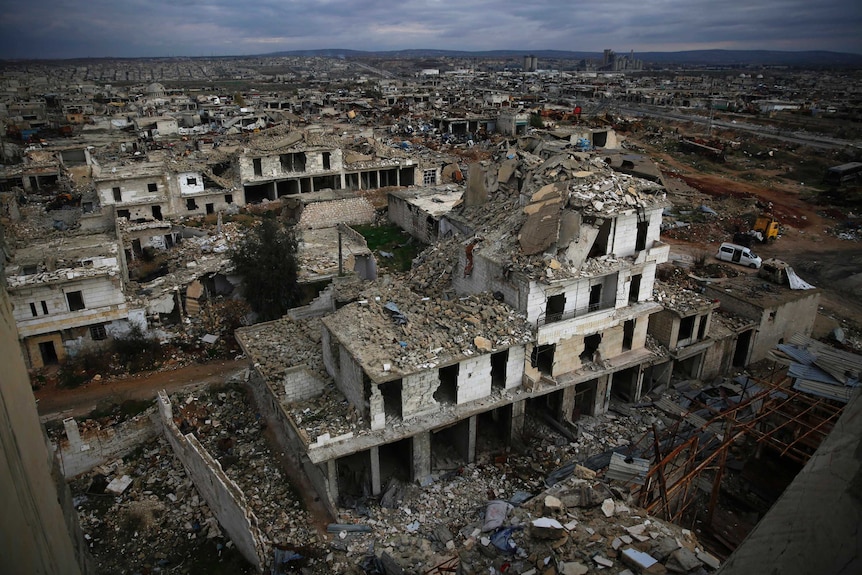 A aerial photo shows widespread destruction of buildings in eastern Aleppo.