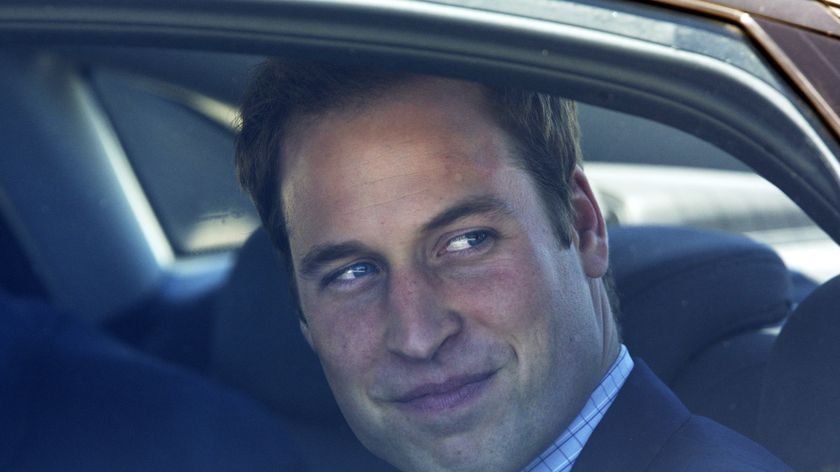 Britain's Prince William is driven away from Sydney's Kingsford Smith airport