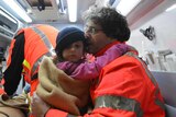 One of the children rescued from the avalanche-hit Rigopiano Hotel is transported to a hospital in Pescara