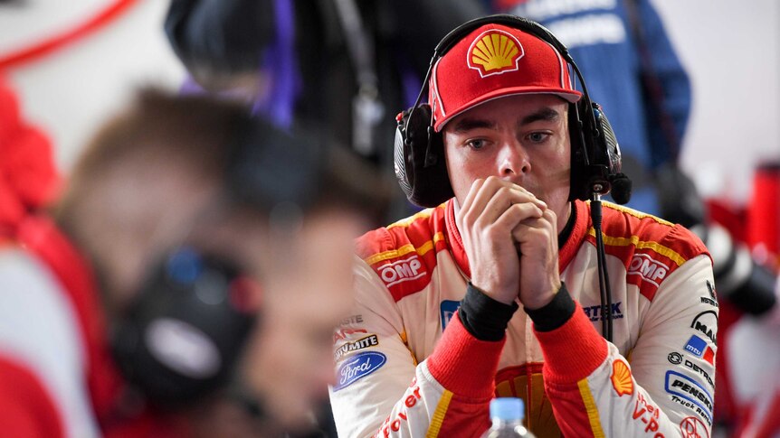 Driver Scott McLaughlin looks sad.