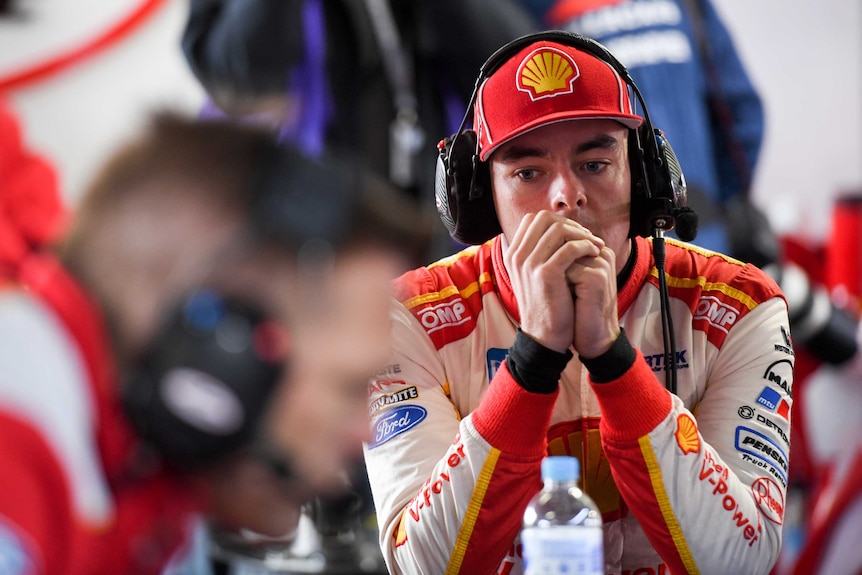 Driver Scott McLaughlin looks sad.