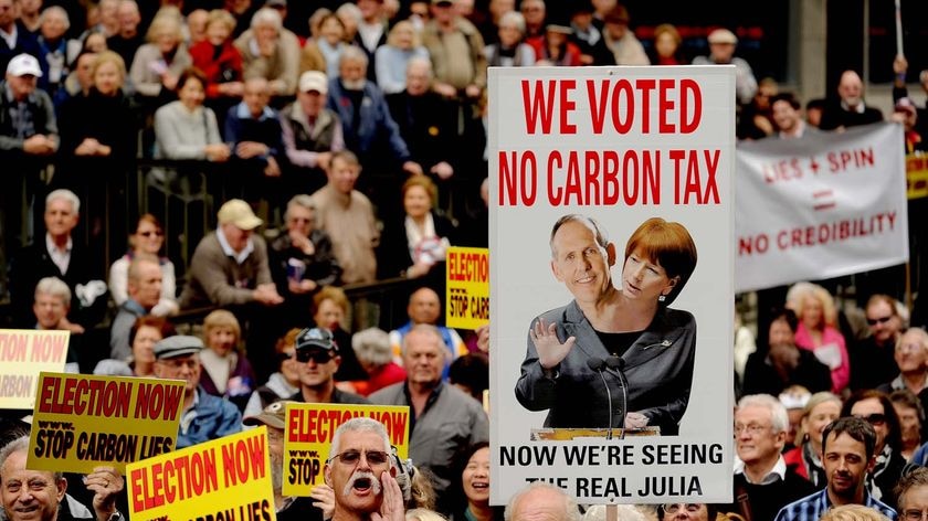 Anti-carbon tax protesters march in Sydney on July 1, 2011.