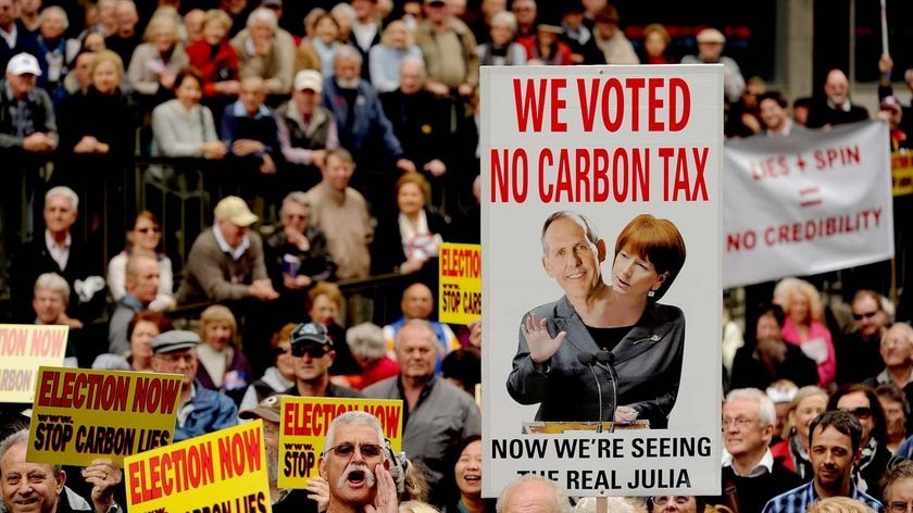 Banners in the crowd took specific aim at Prime Minister Julia Gillard