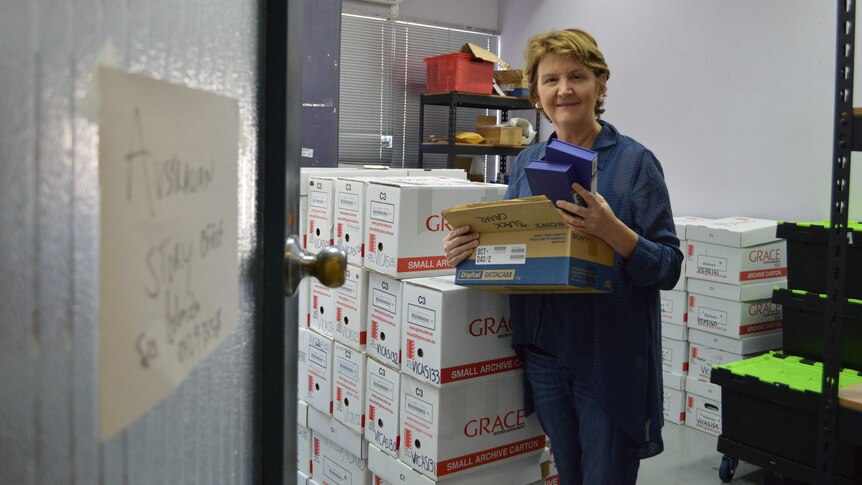 Australian Story producer Belinda Hawkins with tapes.