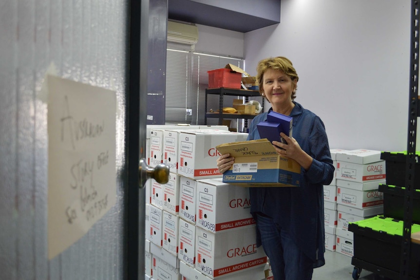 Australian Story producer Belinda Hawkins with tapes.