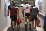 Manly's Kieran Foran walks up the tunnel after coming off injured against Parramatta.